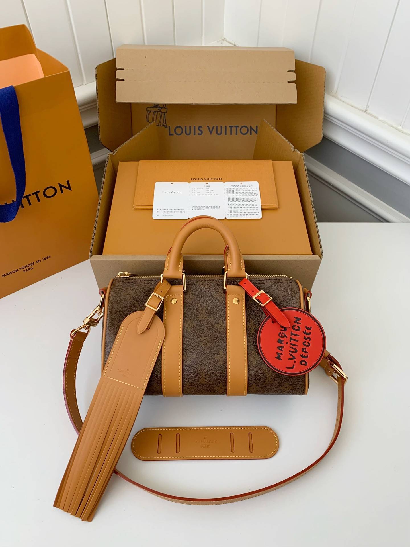 L*V The New Keepall Bandouli ère 25 handbag M11542 Size:25*15*11cm