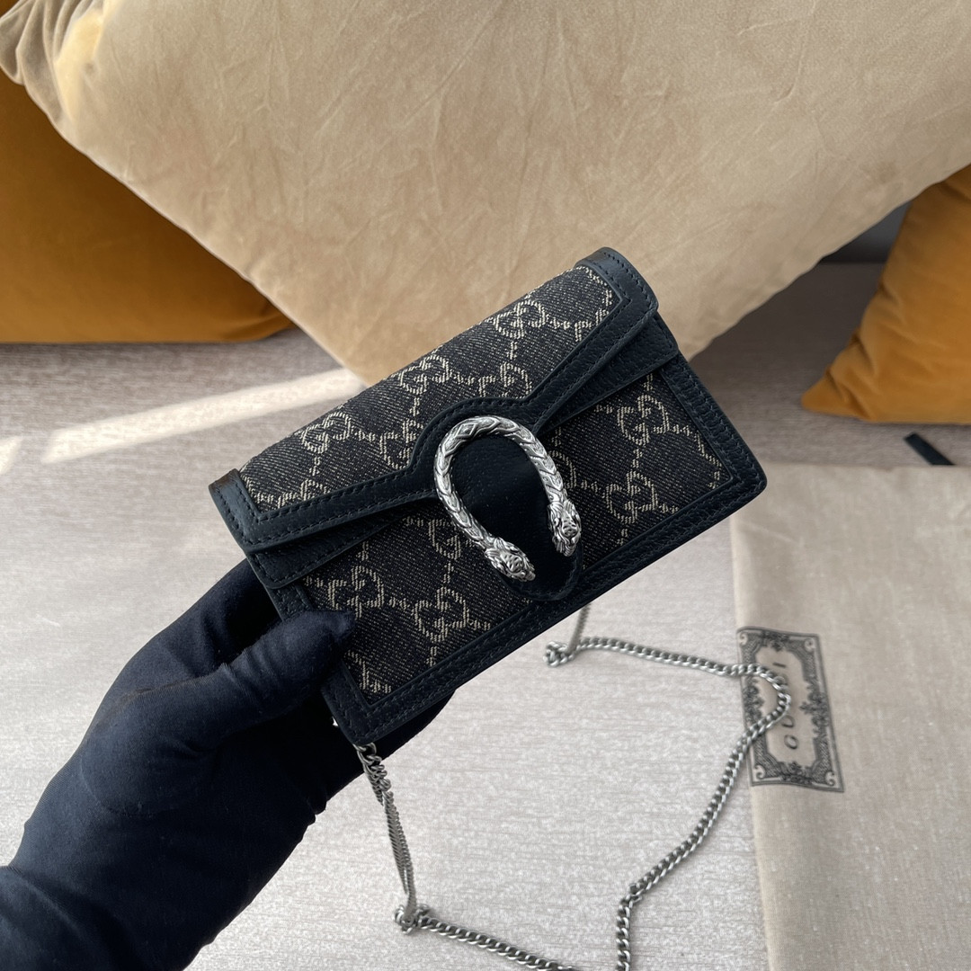 G*u*i dionysus bag